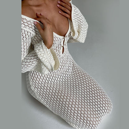 Person wearing a white crochet outfit against a gray background